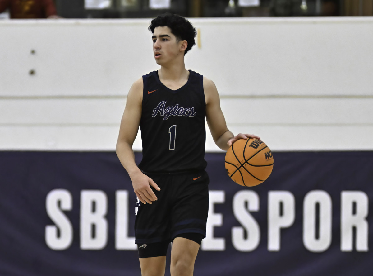 Montgomery junior Xair Mendez dribbles up the court during December's Torrey Pines Holiday Classic